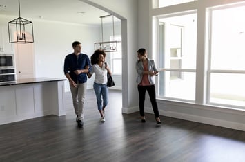 Couple attending an open house